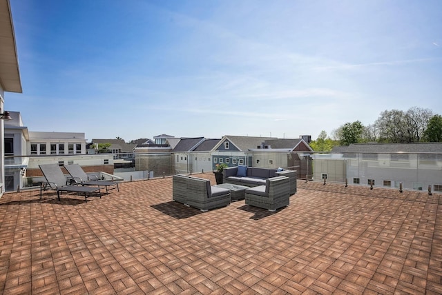 view of patio featuring a residential view and an outdoor living space