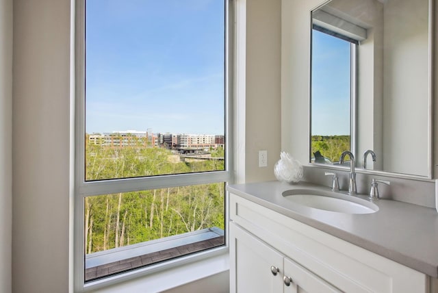 bathroom featuring vanity and plenty of natural light