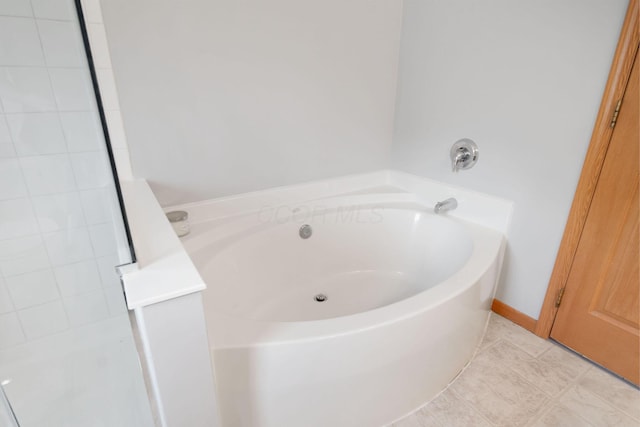 full bathroom with a bath