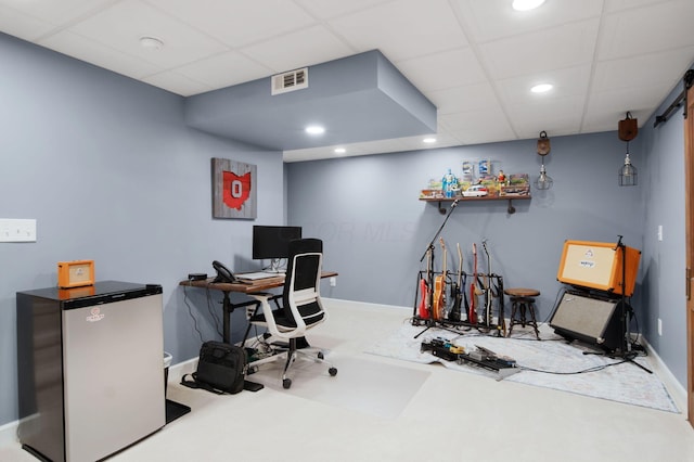 office area featuring recessed lighting, baseboards, visible vents, and a drop ceiling