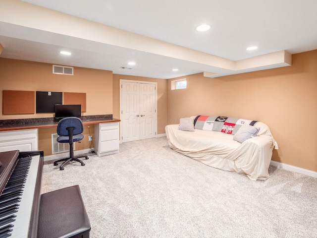 office area with light colored carpet, visible vents, baseboards, and recessed lighting