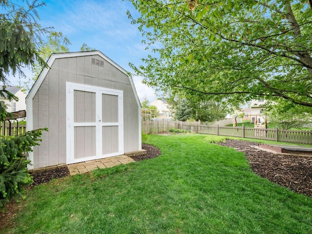 view of shed featuring a fenced backyard