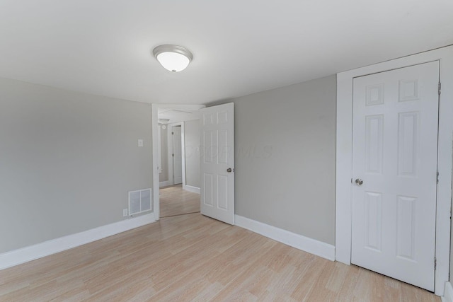 901 Campbell Ave, Columbus, OH 43223 - unfurnished bedroom with light wood finished floors and baseboards