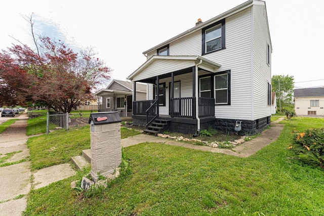901 Campbell Ave, Columbus, OH 43223 - american foursquare style home featuring covered porch and a chimney