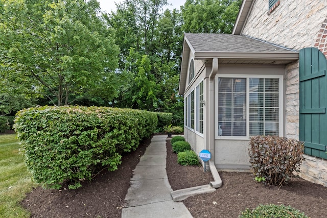 7742 Blue Juniper Dr, Westerville, OH 43082 - view of side of property with roof with shingles