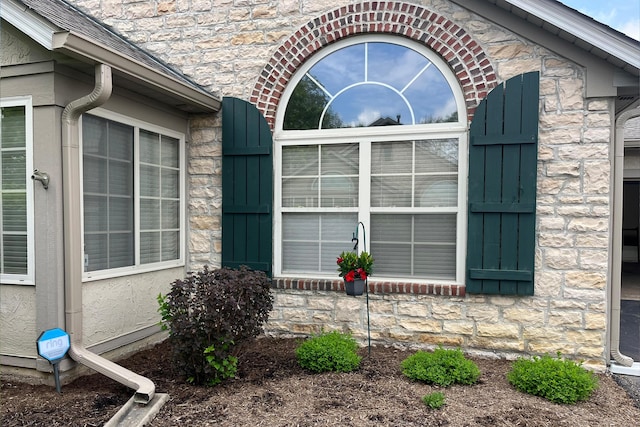 7742 Blue Juniper Dr, Westerville, OH 43082 - view of side of property featuring stone siding