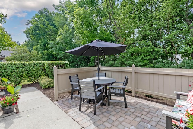 7742 Blue Juniper Dr, Westerville, OH 43082 - view of patio / terrace featuring outdoor dining area and fence