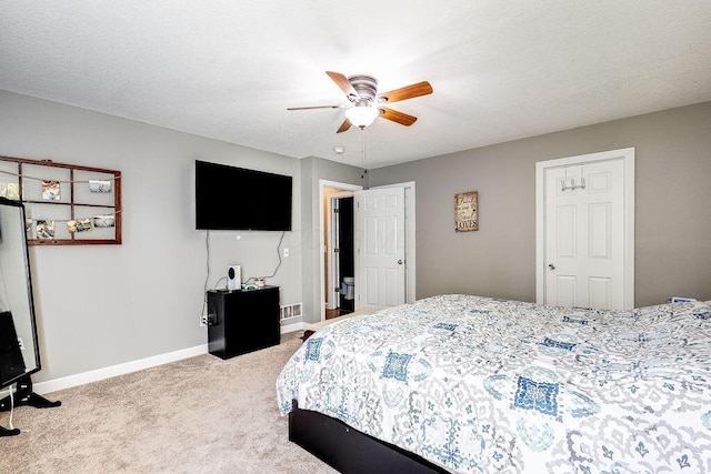 bedroom with baseboards, ceiling fan, and carpet