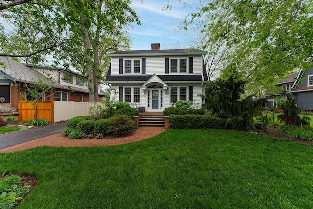 2842 Powell Ave, Columbus, OH 43209 - colonial inspired home featuring a chimney