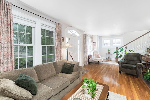 2842 Powell Ave, Columbus, OH 43209 - living area featuring wood finished floors and stairway