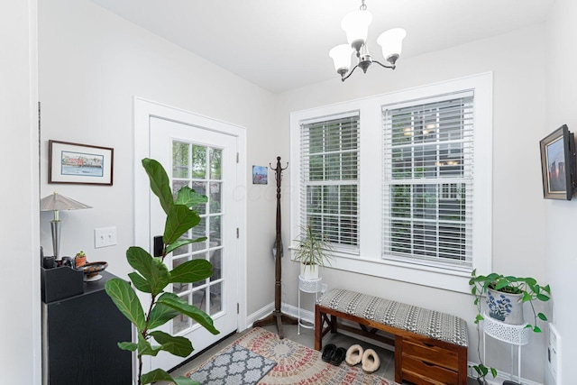 2842 Powell Ave, Columbus, OH 43209 - entryway featuring a chandelier and baseboards
