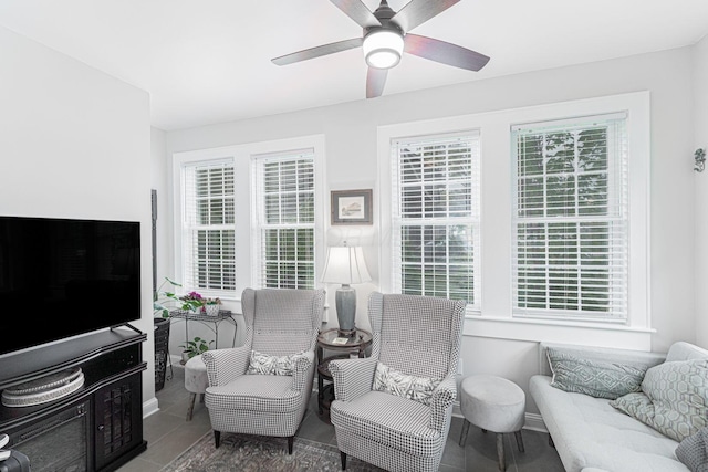 2842 Powell Ave, Columbus, OH 43209 - living room featuring ceiling fan and tile patterned floors