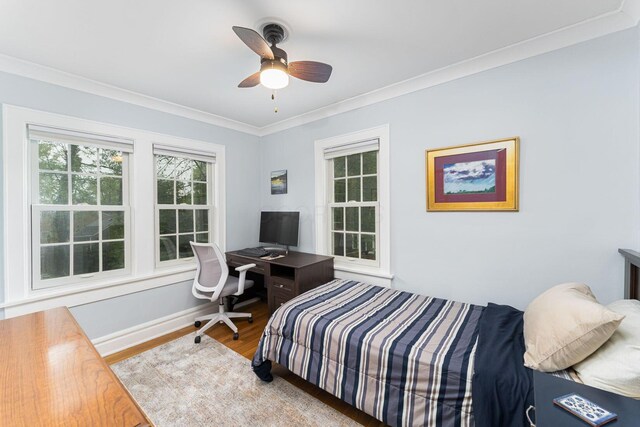 2842 Powell Ave, Columbus, OH 43209 - bedroom featuring wood finished floors, ornamental molding, baseboards, and a ceiling fan