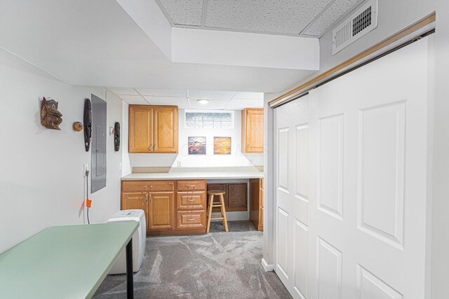 2842 Powell Ave, Columbus, OH 43209 - bathroom featuring a paneled ceiling and electric panel