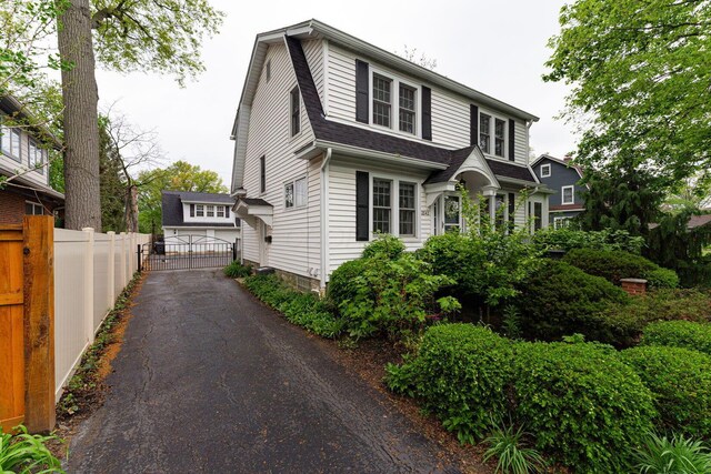 2842 Powell Ave, Columbus, OH 43209 - view of front of home with a shingled roof and a gate