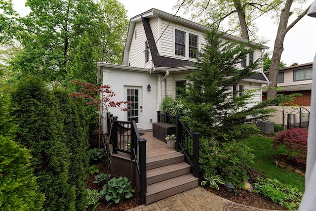 2842 Powell Ave, Columbus, OH 43209 - colonial inspired home featuring cooling unit and a shingled roof