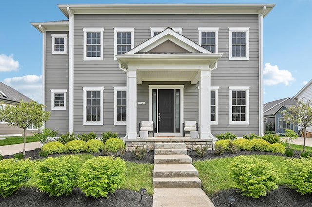 view of neoclassical home