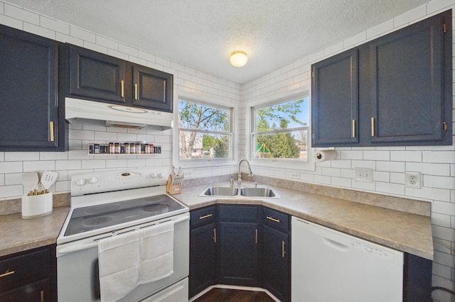 4097 Garrard Dr, Obetz, OH 43207 - kitchen with white appliances, a sink, under cabinet range hood, a textured ceiling, and decorative backsplash