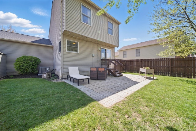 4097 Garrard Dr, Obetz, OH 43207 - back of house with a patio area and central AC