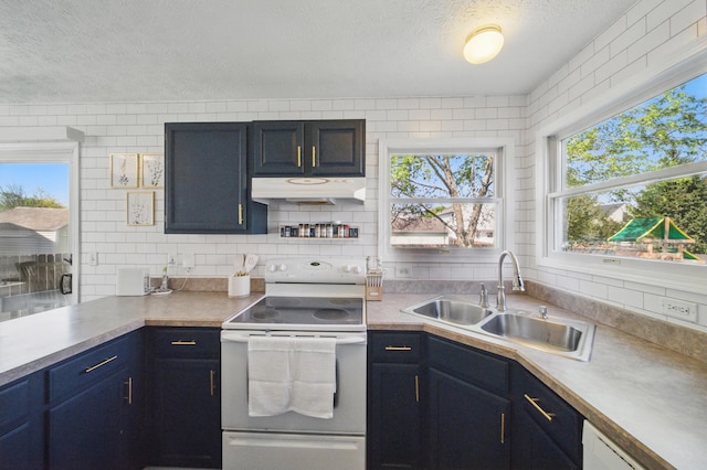 4097 Garrard Dr, Obetz, OH 43207 - kitchen with white appliances, a sink, under cabinet range hood, a textured ceiling, and healthy amount of natural light