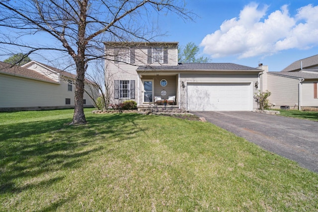 4097 Garrard Dr, Obetz, OH 43207 - traditional-style house featuring an attached garage, driveway, and a front yard