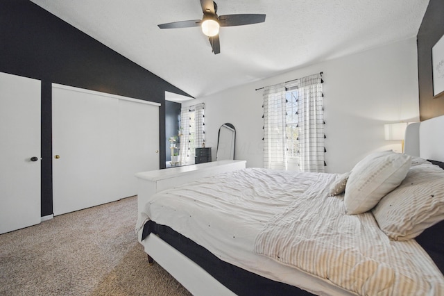 4097 Garrard Dr, Obetz, OH 43207 - bedroom with carpet flooring, lofted ceiling, a closet, ceiling fan, and a textured ceiling