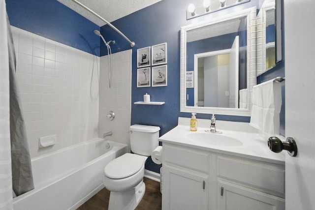 4097 Garrard Dr, Obetz, OH 43207 - bathroom with shower / tub combo, toilet, vanity, wood finished floors, and baseboards