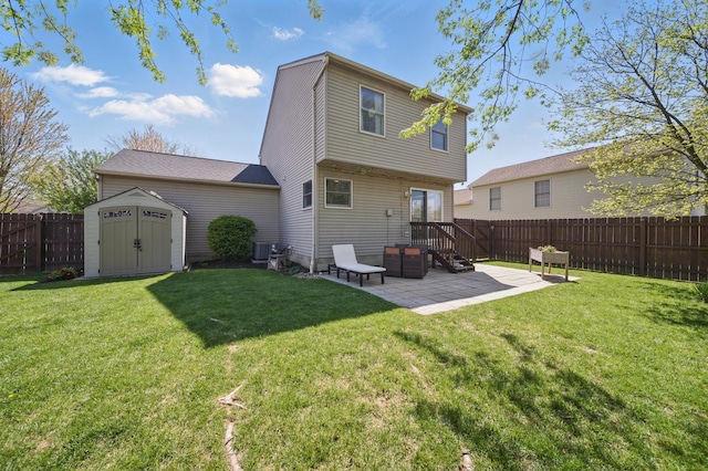 4097 Garrard Dr, Obetz, OH 43207 - rear view of house with a patio and central AC