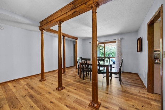 6730 Tussic Rd, Westerville, OH 43082 - dining area featuring light wood-type flooring and baseboards