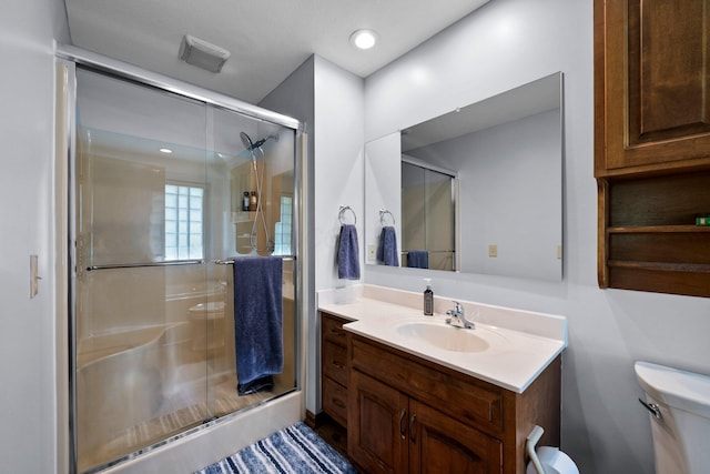 6730 Tussic Rd, Westerville, OH 43082 - full bathroom featuring toilet, a stall shower, and vanity