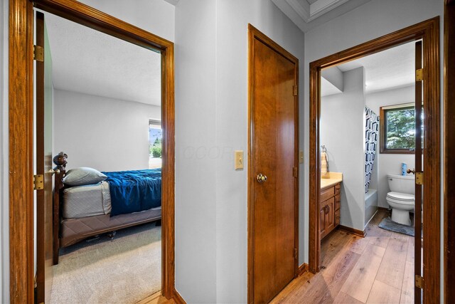 6730 Tussic Rd, Westerville, OH 43082 - full bathroom with ensuite bath, hardwood / wood-style flooring, toilet, vanity, and shower / bathtub combination with curtain