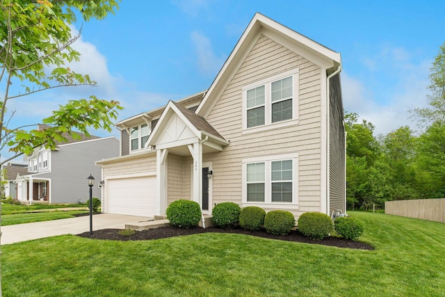 view of front of house featuring driveway and a garage