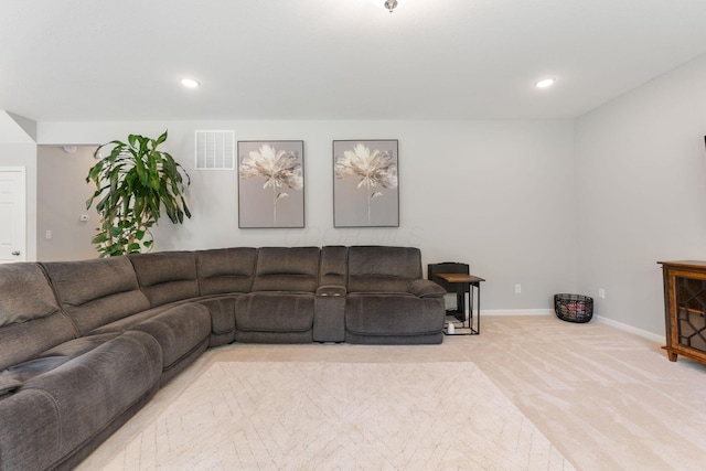 living area with carpet flooring, recessed lighting, and baseboards