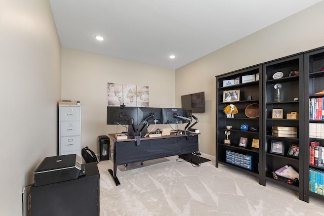 carpeted office space with recessed lighting and baseboards