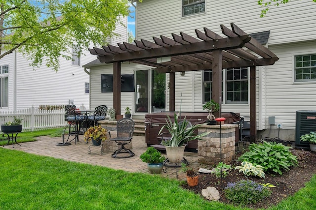 670 Mill Wood Blvd, Marysville, OH 43040 - view of patio / terrace with a hot tub, cooling unit, and a pergola