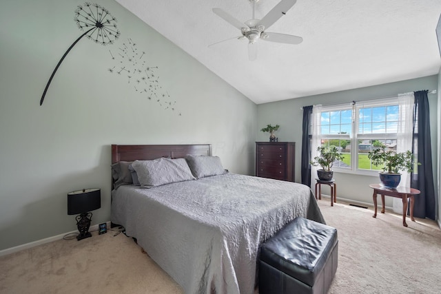 670 Mill Wood Blvd, Marysville, OH 43040 - bedroom with light carpet, vaulted ceiling, baseboards, and a ceiling fan