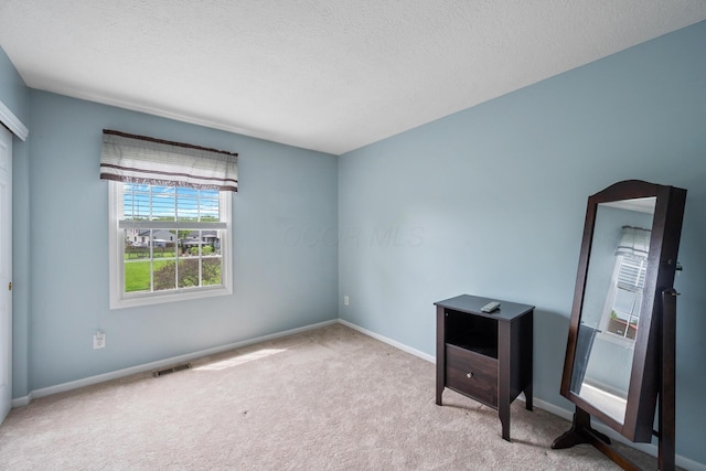 670 Mill Wood Blvd, Marysville, OH 43040 - unfurnished room featuring carpet flooring, baseboards, and a textured ceiling