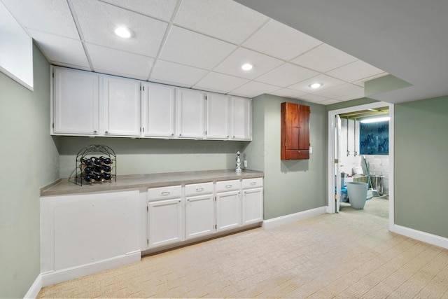 670 Mill Wood Blvd, Marysville, OH 43040 - bar featuring baseboards, recessed lighting, and a paneled ceiling