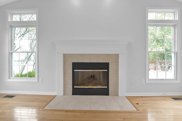 7553 Indian Creek Way, Powell, OH 43065 - detailed view of wood finished floors and a tile fireplace