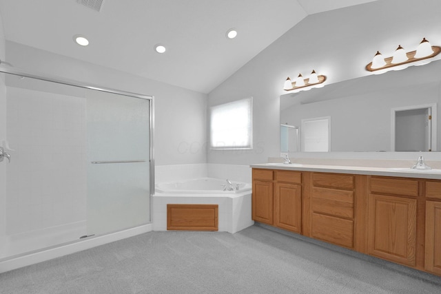 7553 Indian Creek Way, Powell, OH 43065 - bathroom with lofted ceiling, a shower stall, a garden tub, double vanity, and recessed lighting