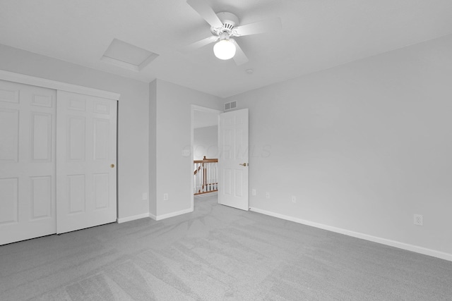 7553 Indian Creek Way, Powell, OH 43065 - unfurnished bedroom featuring attic access, carpet floors, a closet, and a ceiling fan