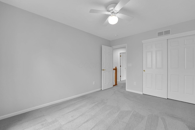 7553 Indian Creek Way, Powell, OH 43065 - unfurnished bedroom with carpet flooring, a closet, and a ceiling fan