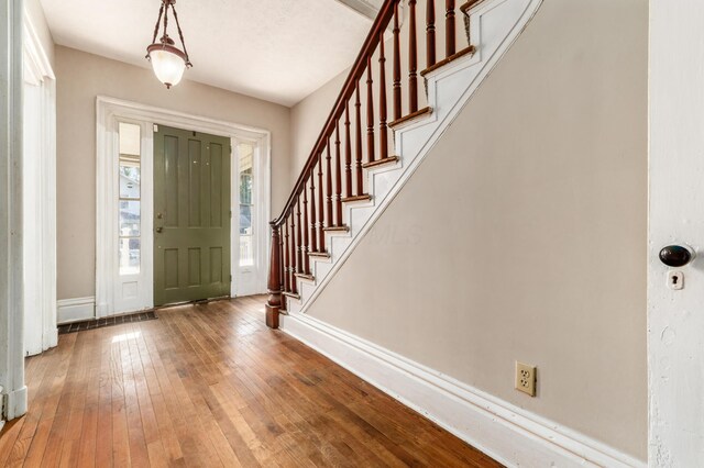 626 Evans St, Newark, OH 43055 - foyer with stairs and wood-type flooring