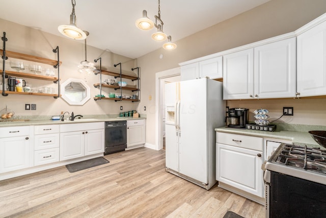 626 Evans St, Newark, OH 43055 - kitchen featuring white refrigerator with ice dispenser, dishwasher, and white cabinetry