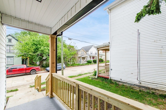 view of patio / terrace with covered porch and a residential view