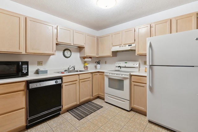 kitchen featuring black appliances, light countertops, light brown cabinetry, and under cabinet range hood