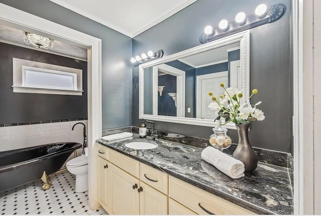 bathroom featuring a soaking tub, crown molding, toilet, and vanity
