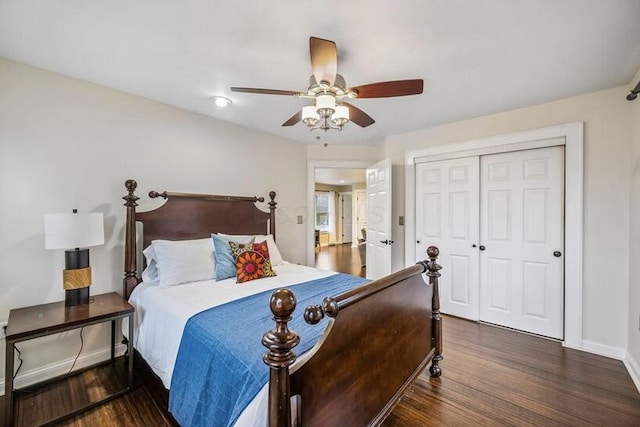 bedroom with ceiling fan, a closet, baseboards, and wood finished floors