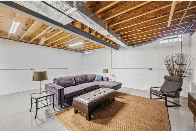 living room featuring finished concrete floors