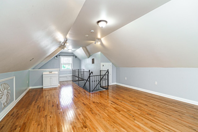 1225 Eastview Ave, Columbus, OH 43212 - bonus room with light wood-style floors, baseboards, and lofted ceiling
